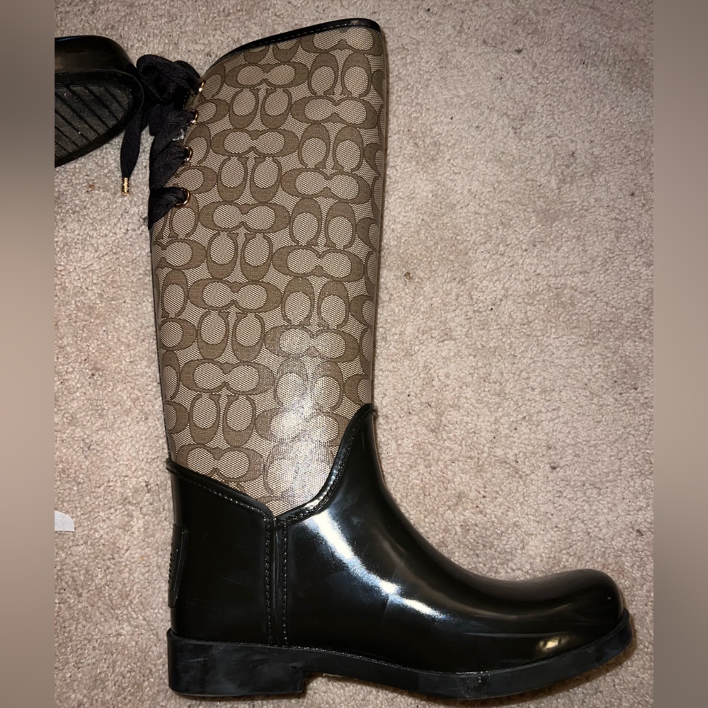 Coach tall, lace up, chestnut colored rain boots size 10.